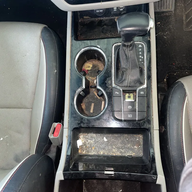 Mobile car detailing Sydney: centre console before detailing