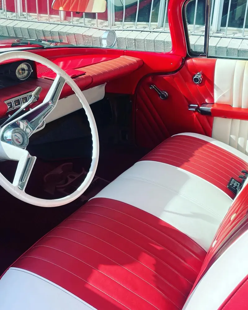 Classic Chevrolet interior with red and white trim