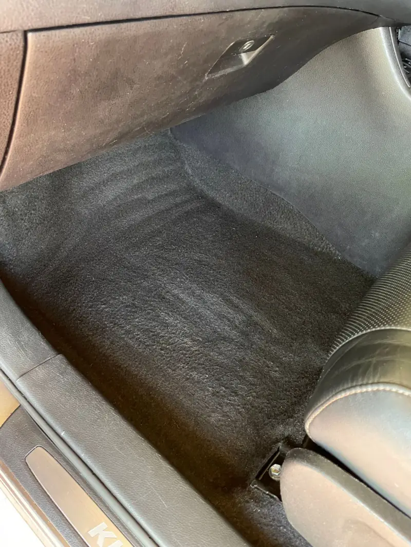 Car detailing in Penrith: dirty front floor mat before cleaning