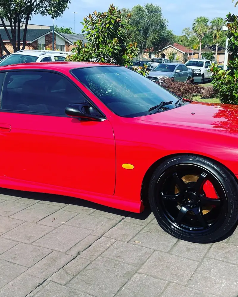 Paint protection in Cronulla: red sports car with glossy paint
