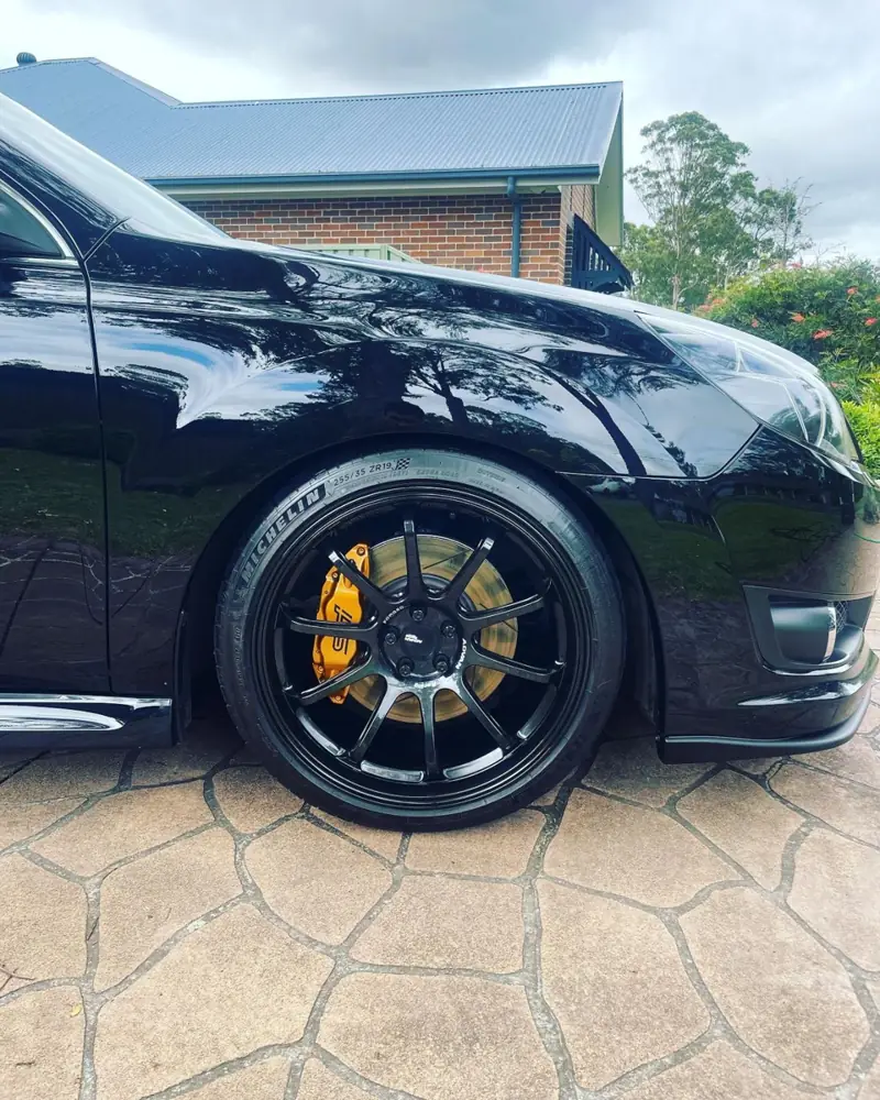 Paint protection in Camden: black sports car with glossy paint