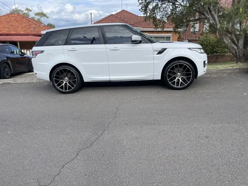 Paint protection in Caringbah: white Range Rover Sport with glossy paint