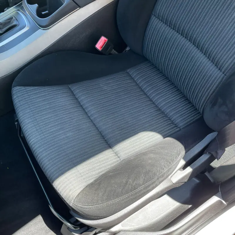 Car detailing in Mount Annan: front cloth seat after steam cleaning